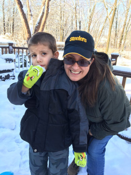 Jennifer Jones and son in the snow