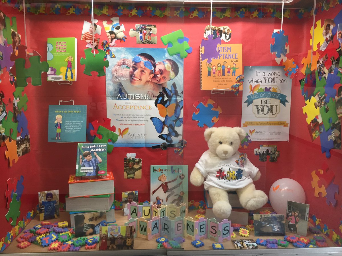 Classroom display with posters and puzzle pieces