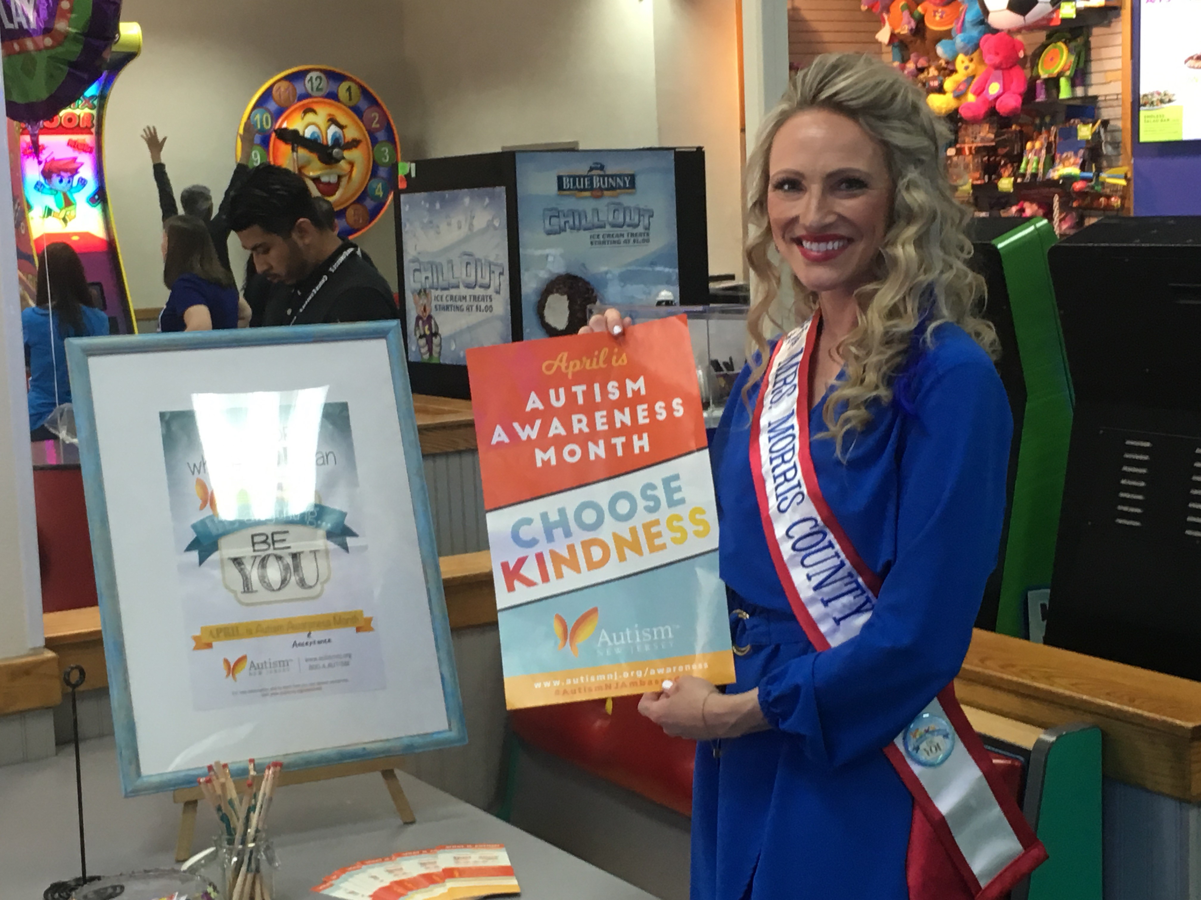 Ambassador of the Week Valerie Cullari holding a Choose Kindness poster