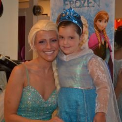 Valerie Cullari dressed as Elsa with young girl